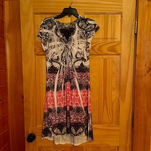 Women’s black, gray, pink and white dress.